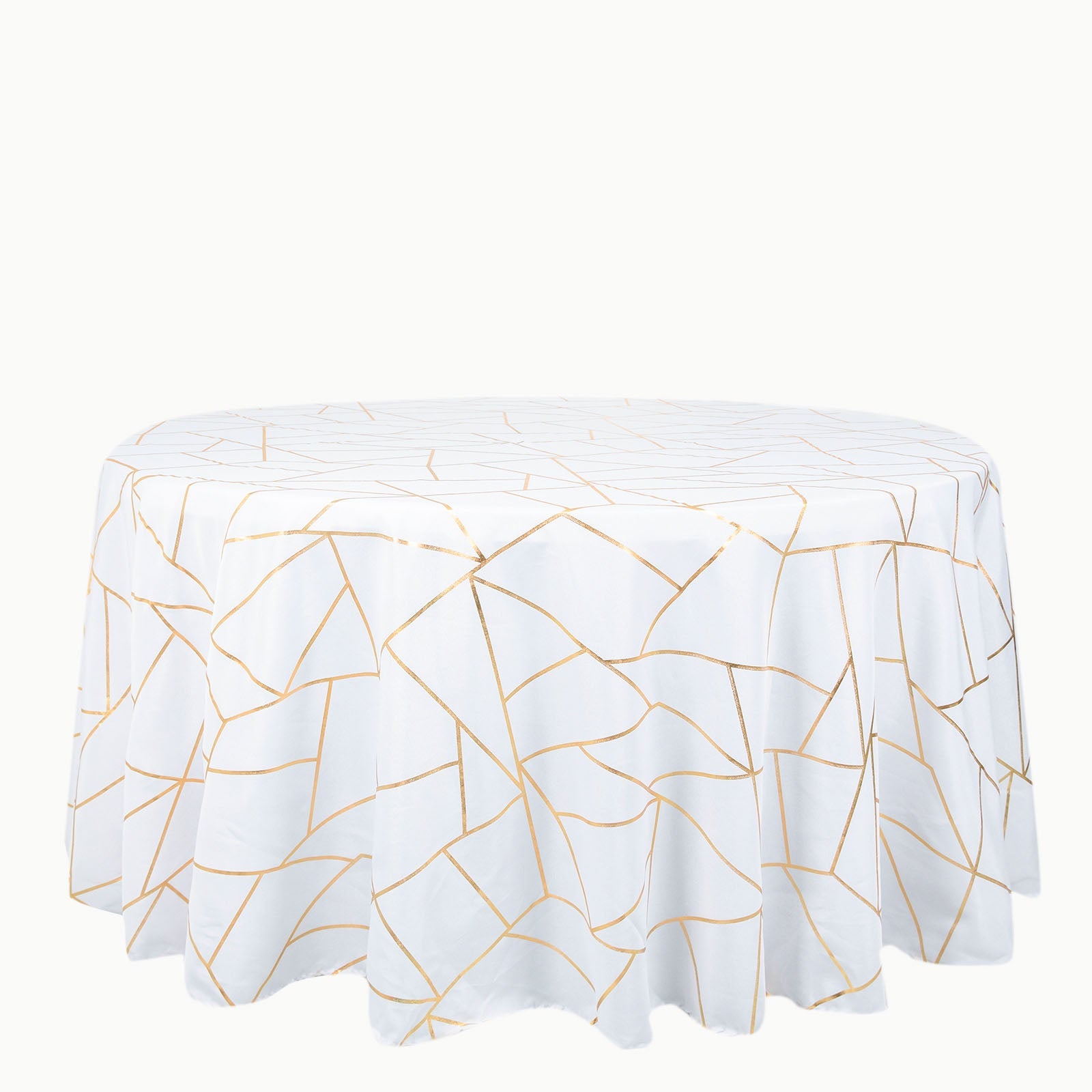 White tablecloth with gold foil geometric pattern, 120 inches round.