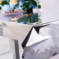 Silver metallic foil tablecloth on a dining table.