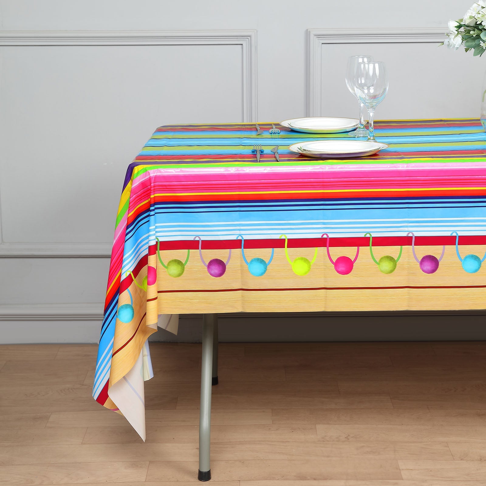 Colorful Mexican serape table cover for Cinco de Mayo, 54"x108", disposable and waterproof.