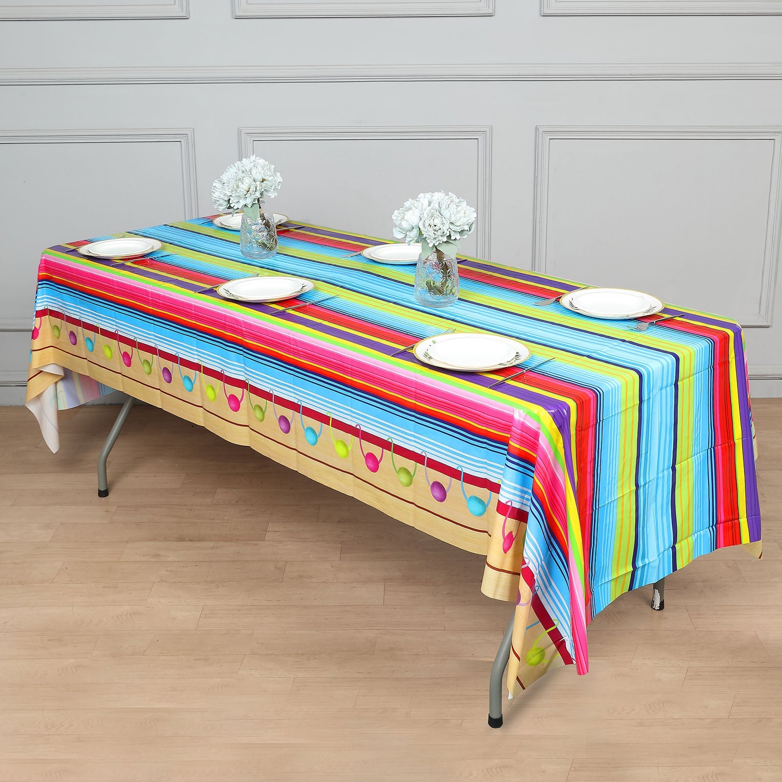 Colorful Mexican serape table cover, perfect for Cinco De Mayo celebrations.