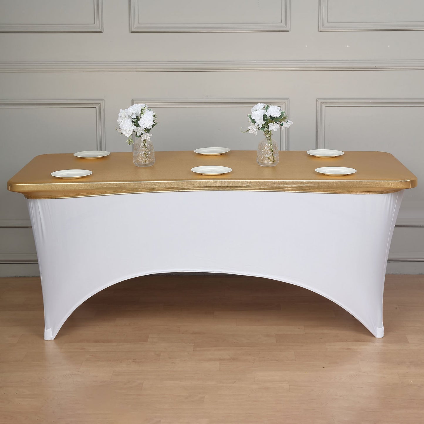 Metallic gold fitted table cover for 6ft banquet table with floral decor.