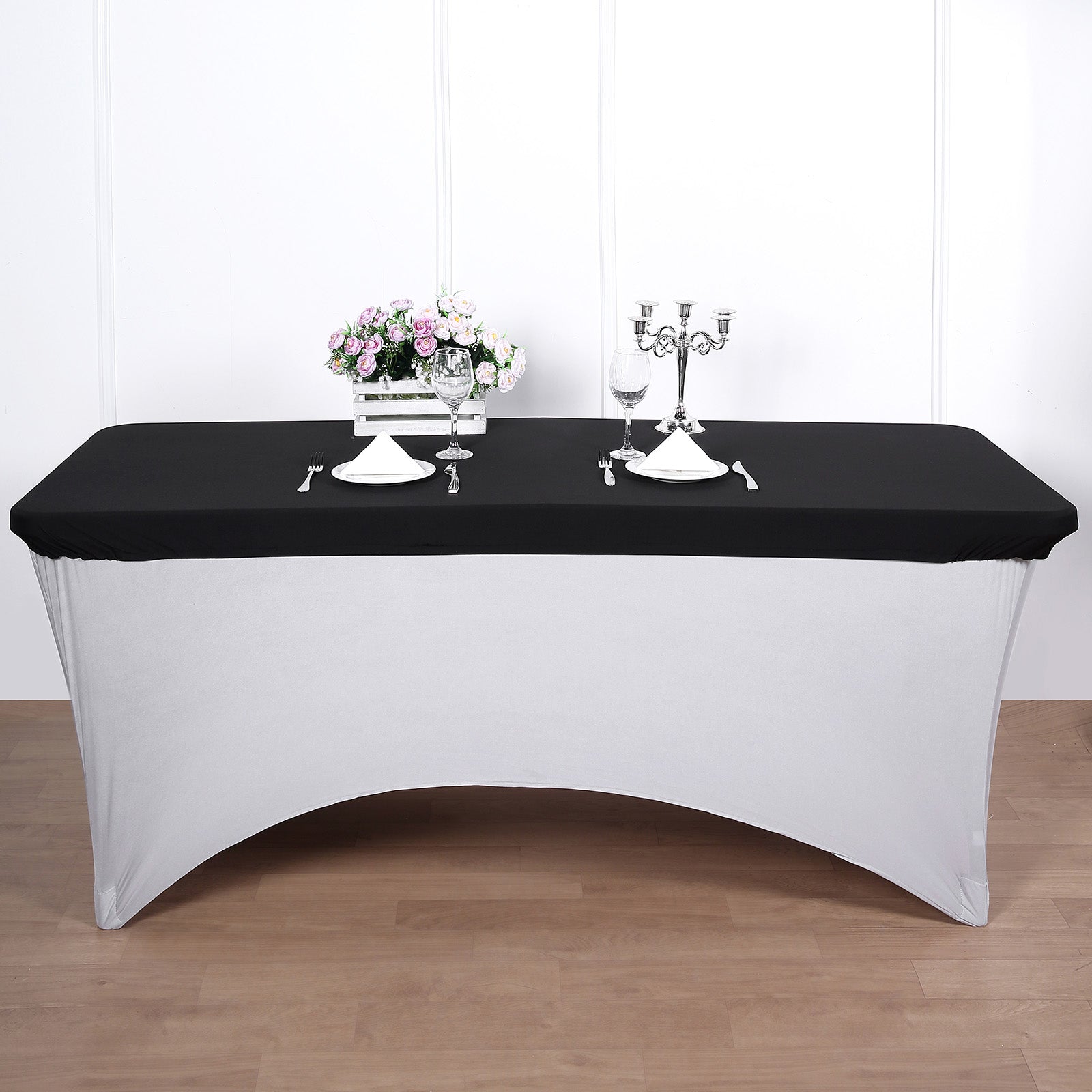 Black stretch spandex fitted table cover for 72"x30" tables.