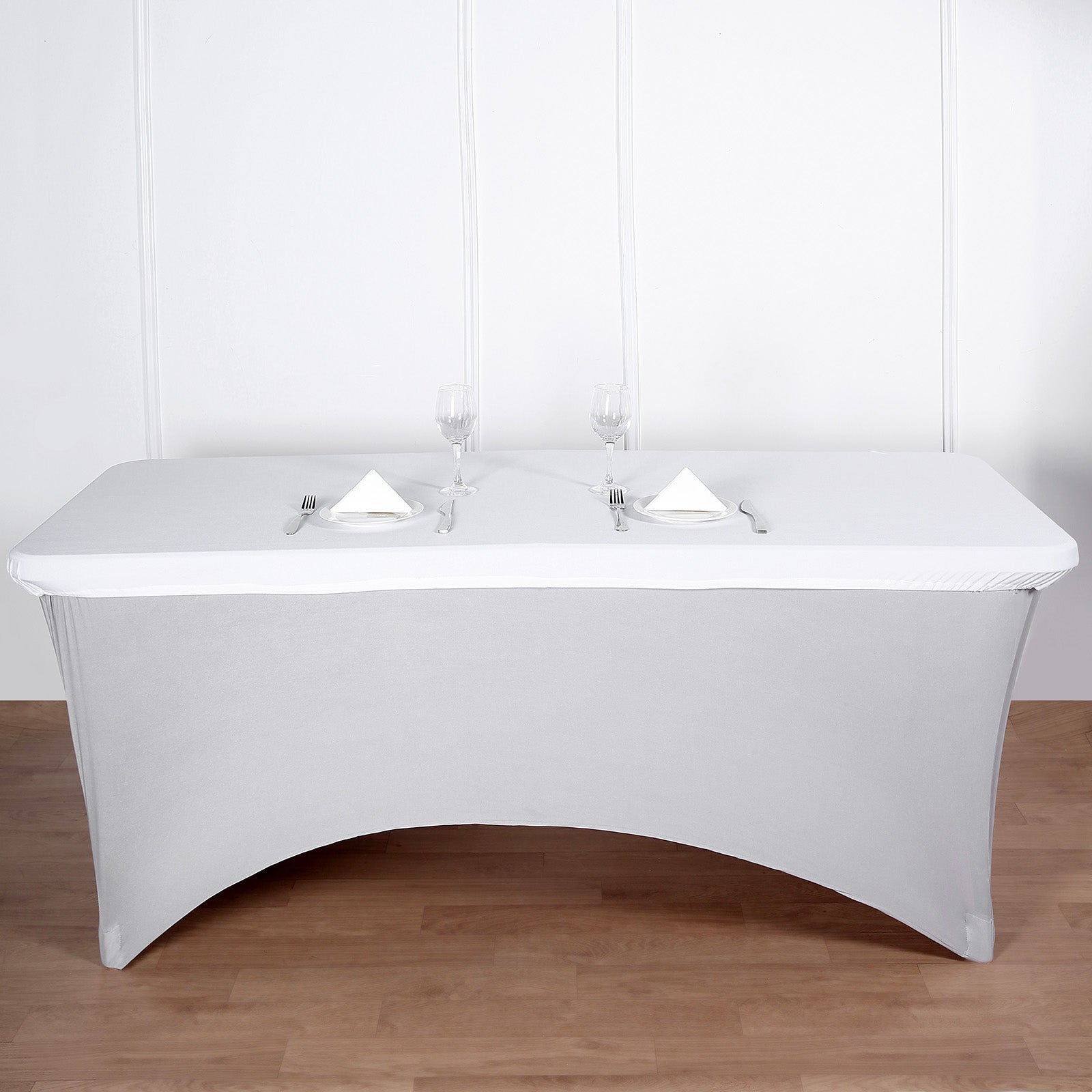White fitted table cover for 6ft banquet table, wrinkle-free and stylish.