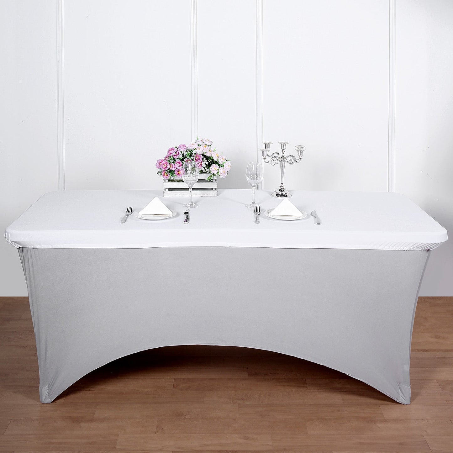 White fitted table cover for 6ft banquet table with elegant setting.