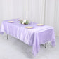 Lavender satin rectangular tablecloth on a dining table.