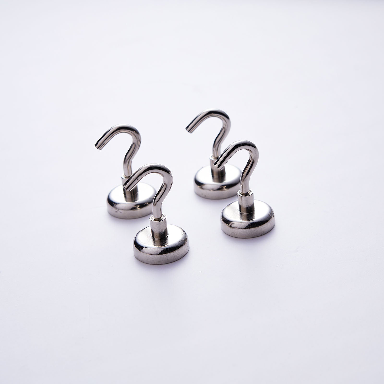 Silver heavy-duty magnetic hooks for versatile hanging needs.