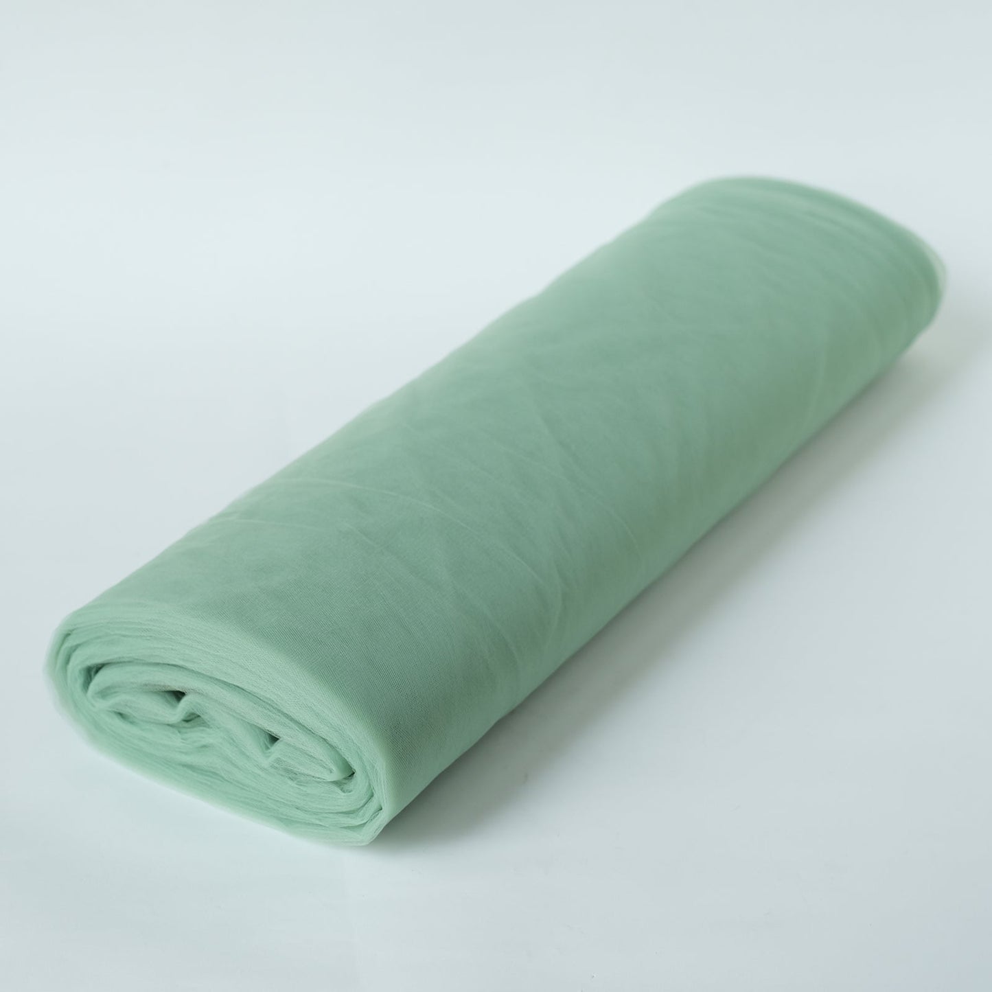 Sage green tulle fabric roll, 108"x50 yards, perfect for DIY crafts.