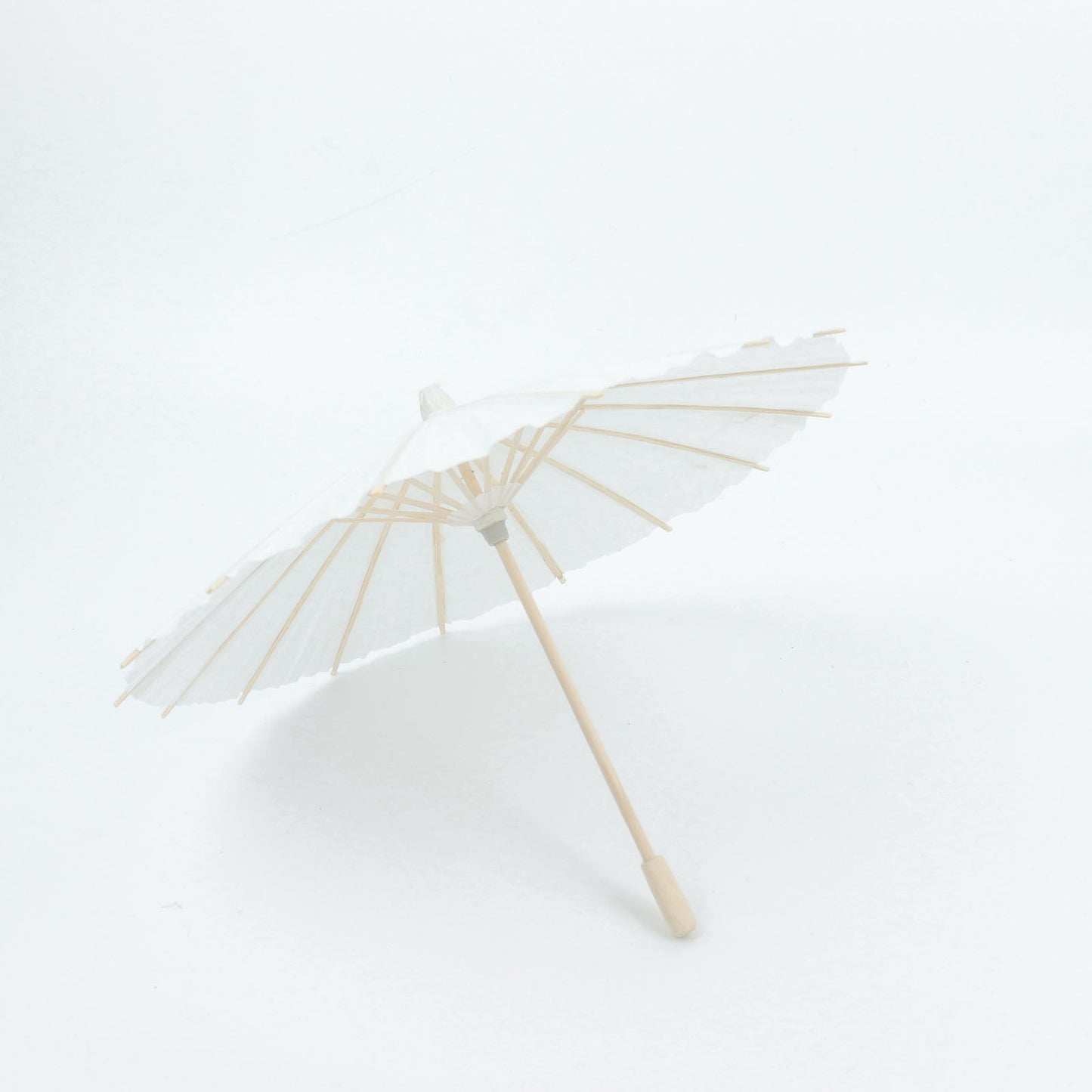 White bamboo parasol umbrella for weddings and parties.