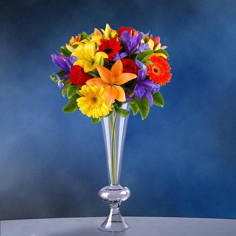 Reversible crystal ball trumpet glass vase filled with vibrant flowers.