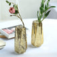 Gold geometric vases with flowers, perfect for centerpieces and decor.