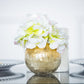 Gold foiled crackle glass bud vase with white flowers centerpiece.