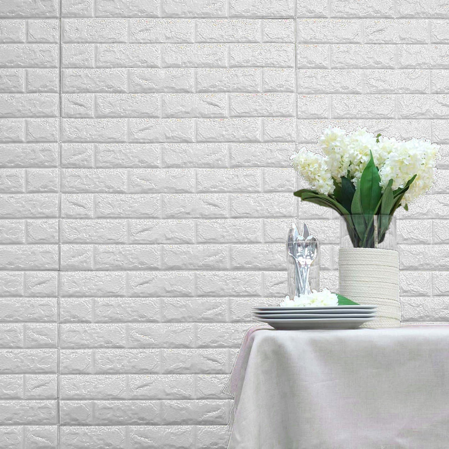 White foam brick peel and stick 3D wall tile panels for home decor.