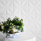 White 3D foam self-adhesive wall panels with diamond design.