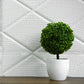 White 3D foam self-adhesive wall panels with alligator skin texture.