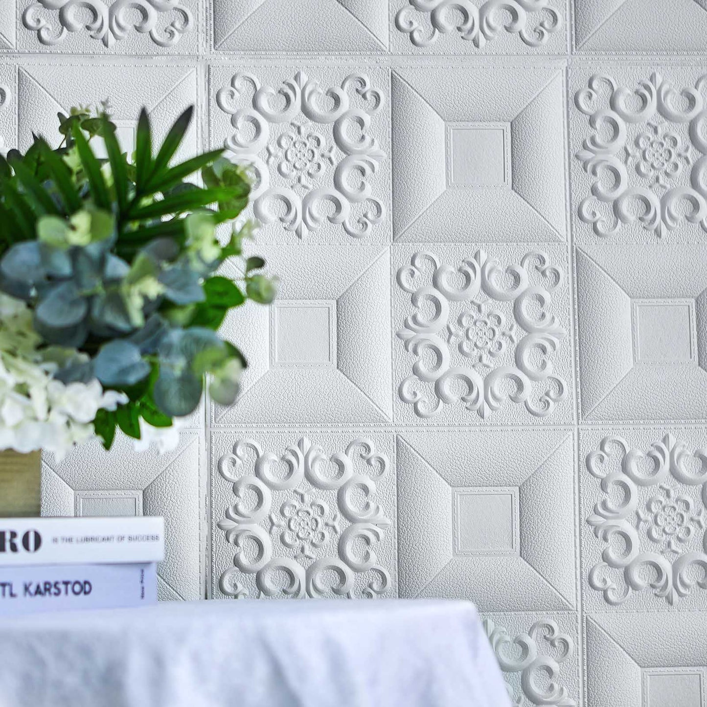 3D white foam self-adhesive wall panels with French design.