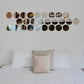Acrylic round mirror wall stickers in a light color for home decor.