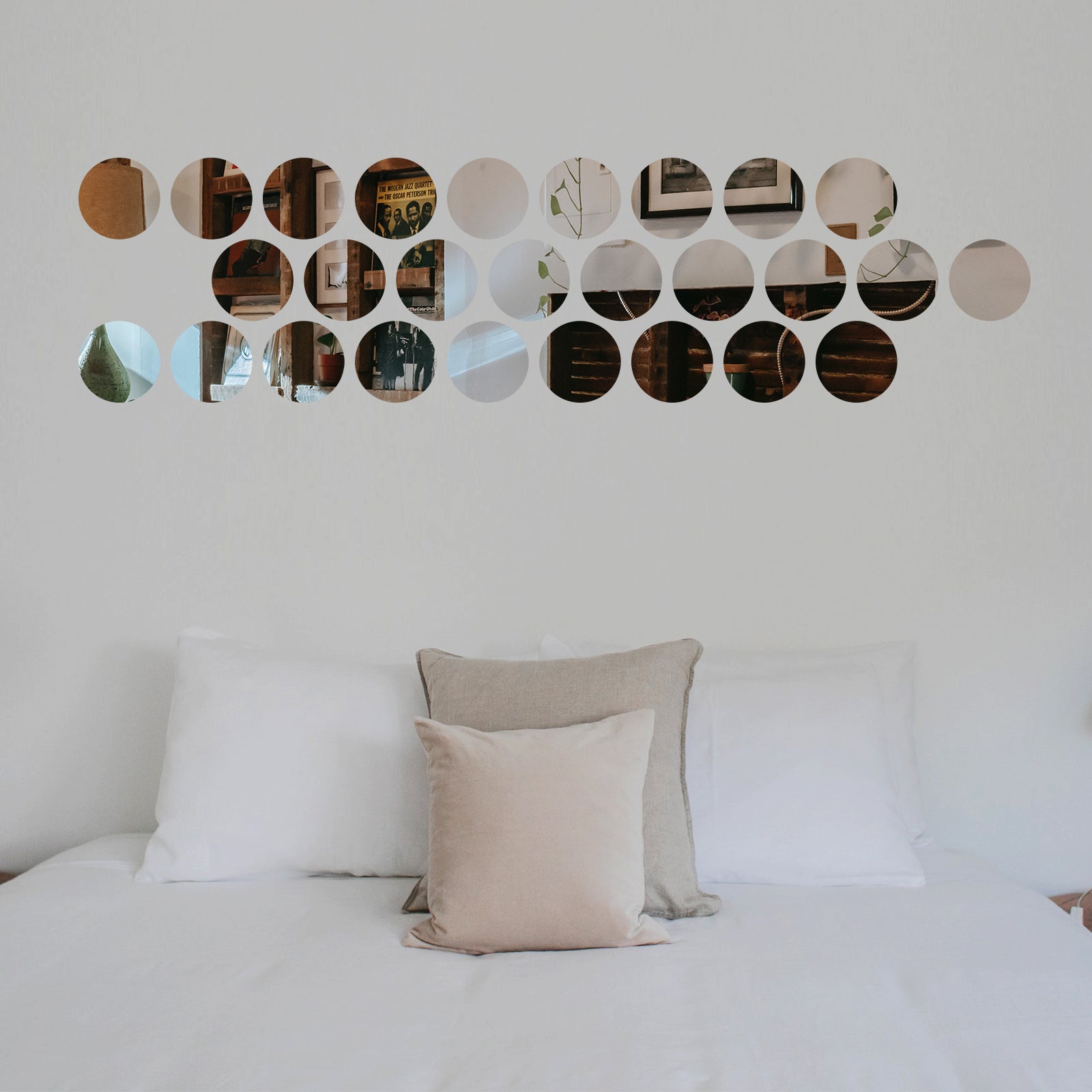 Acrylic round mirror wall stickers in a light color for home decor.