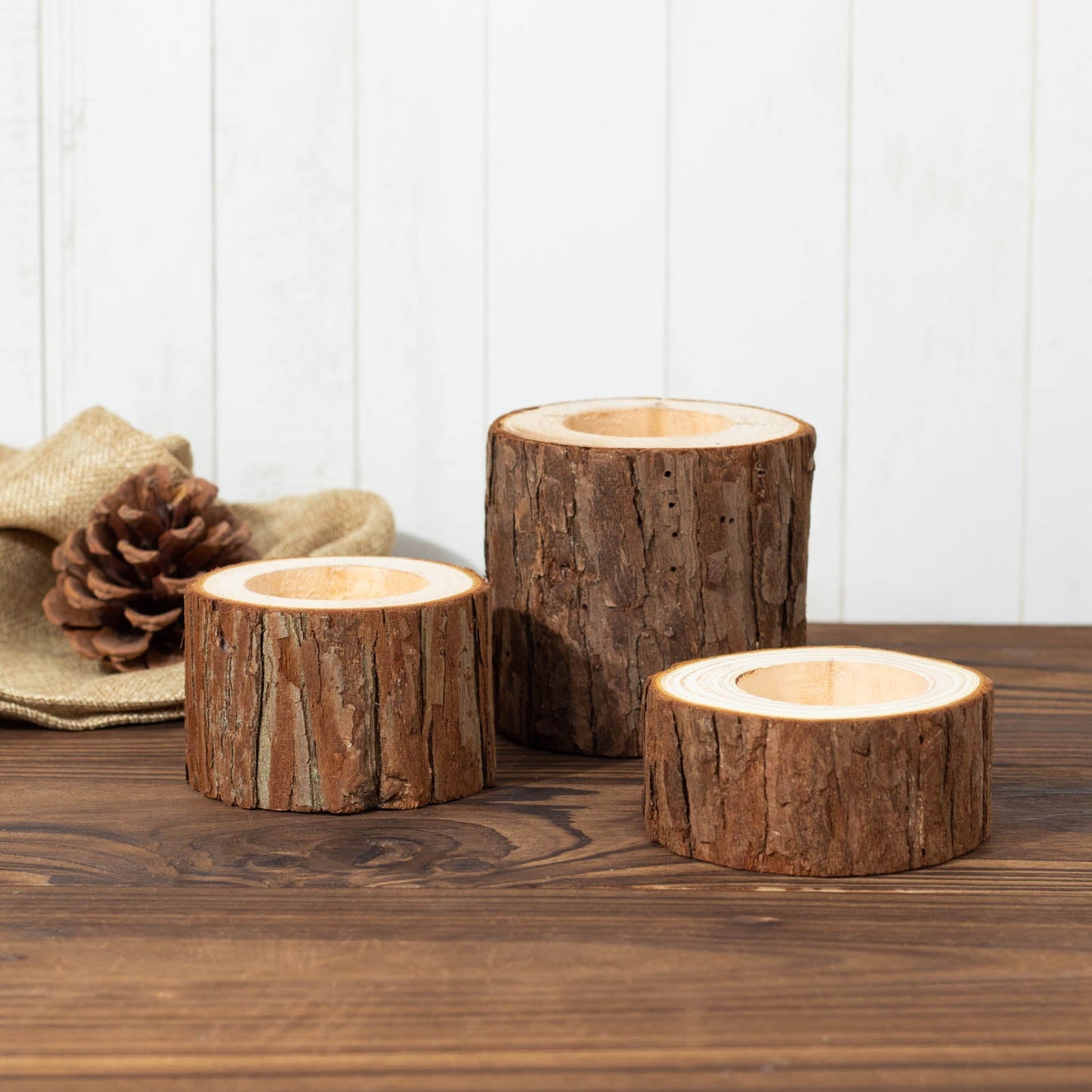 Rustic wood slice tealight candle holders, perfect for farmhouse décor.