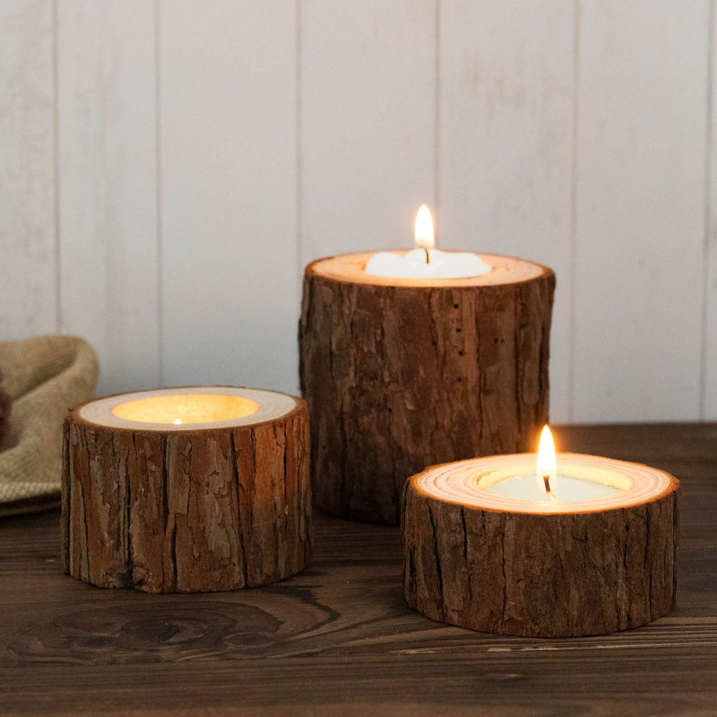 Rustic wood slice tealight candle holders for farmhouse wedding décor.