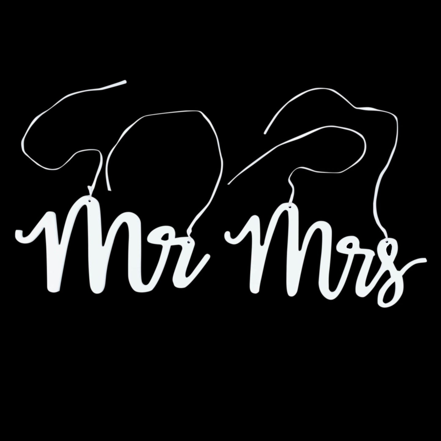 White wood Mr and Mrs chair signs with calligraphy for wedding decor.