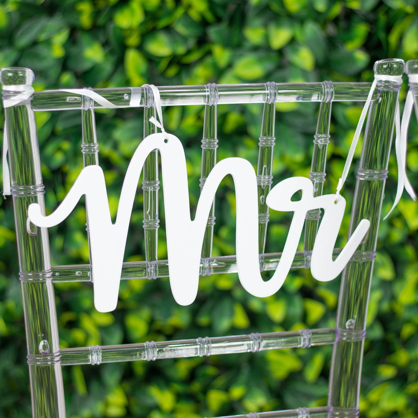 White wood Mr and Mrs chair signs for wedding decor.
