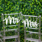 White wood Mr and Mrs chair signs for wedding decor.