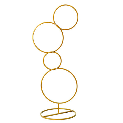 Gold metal hoop pillar flower stand for weddings and events.