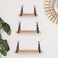 Wood and metal floating wall shelves with a natural wood finish and black brackets.