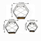 Black hexagonal floating wall shelves in three sizes, geometric design.