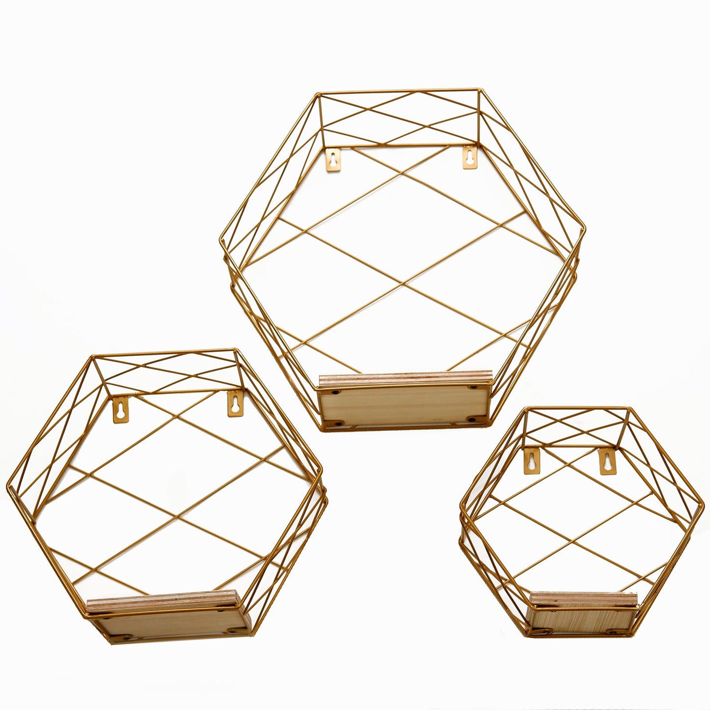 Gold hexagonal floating wall shelves in three sizes.