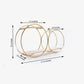 Gold 2-tier round floating shelf with double hoop design for dessert display.