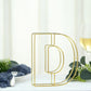 Gold decorative wire letter "D" centerpiece for weddings.