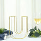 Gold freestanding 3D decorative wire letter U wedding centerpiece.