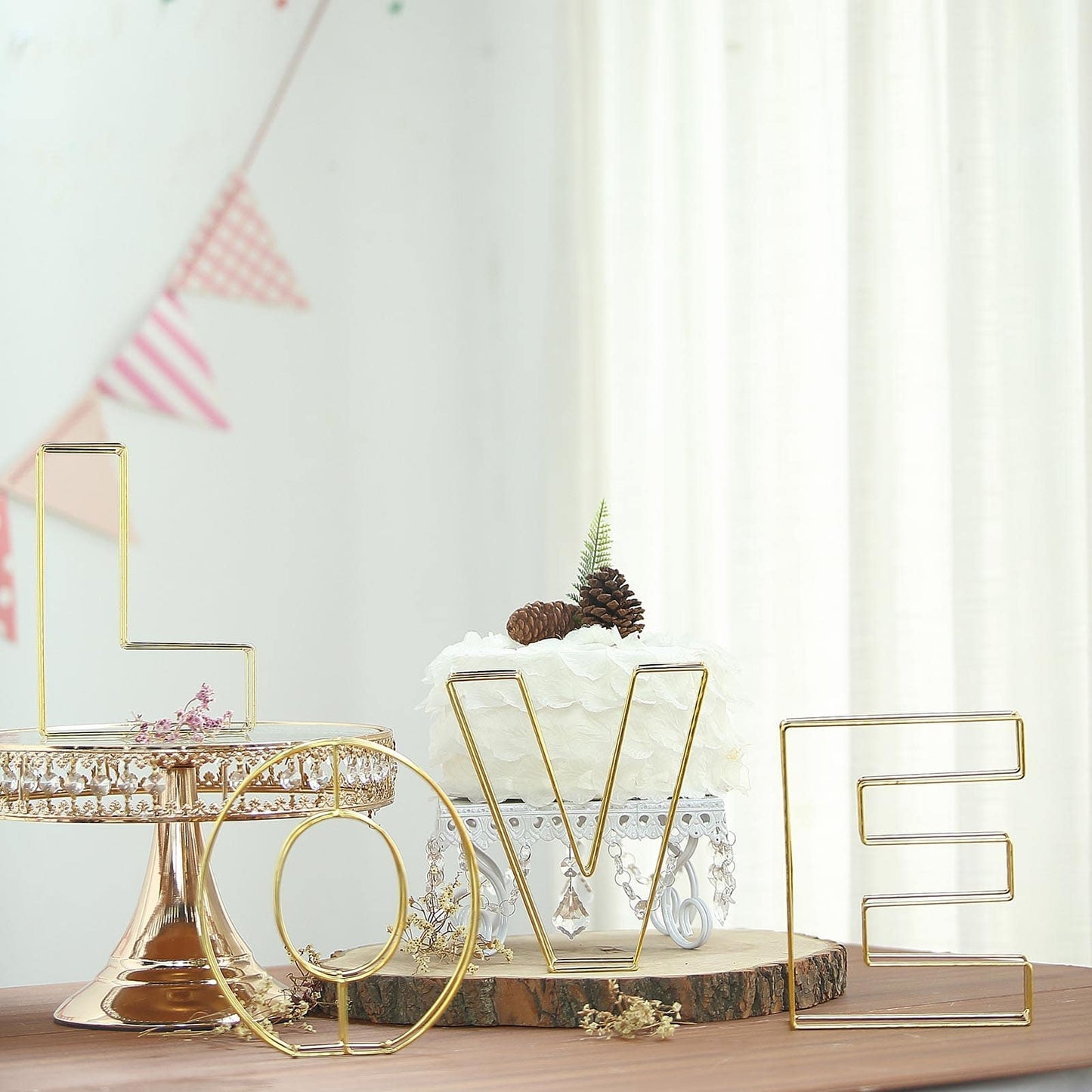 Gold freestanding 3D decorative wire letter centerpiece for weddings.