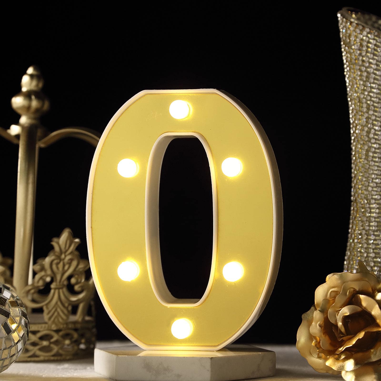 Warm white 3D marquee number "0" with LED lights.