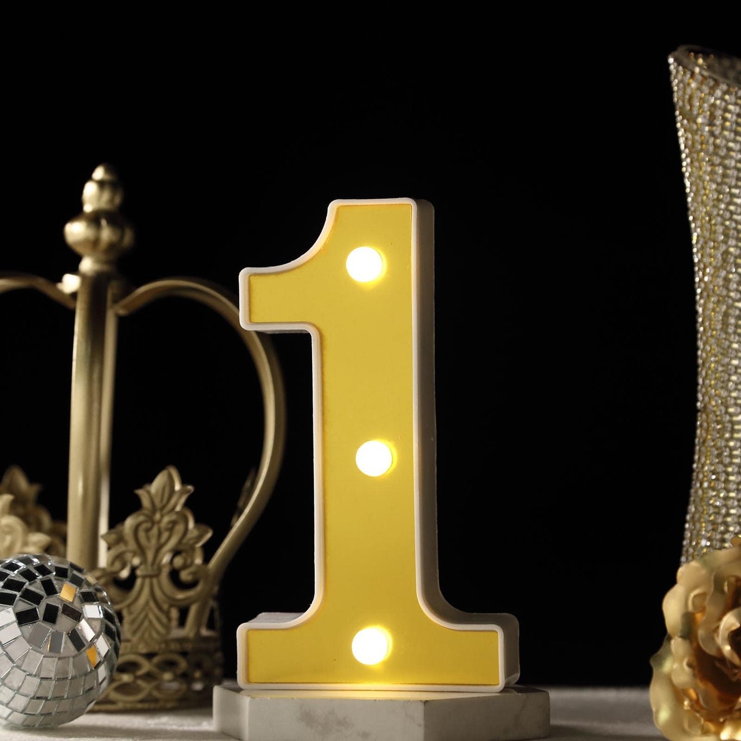 Yellow 3D marquee number 1 with warm white LED lights.