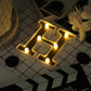 Gold 3D marquee letter "H" with warm white LED lights.