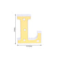 Gold 3D marquee letter "L" with warm white LED lights.