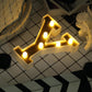 Warm white LED light-up letter "Y" with gold accents.