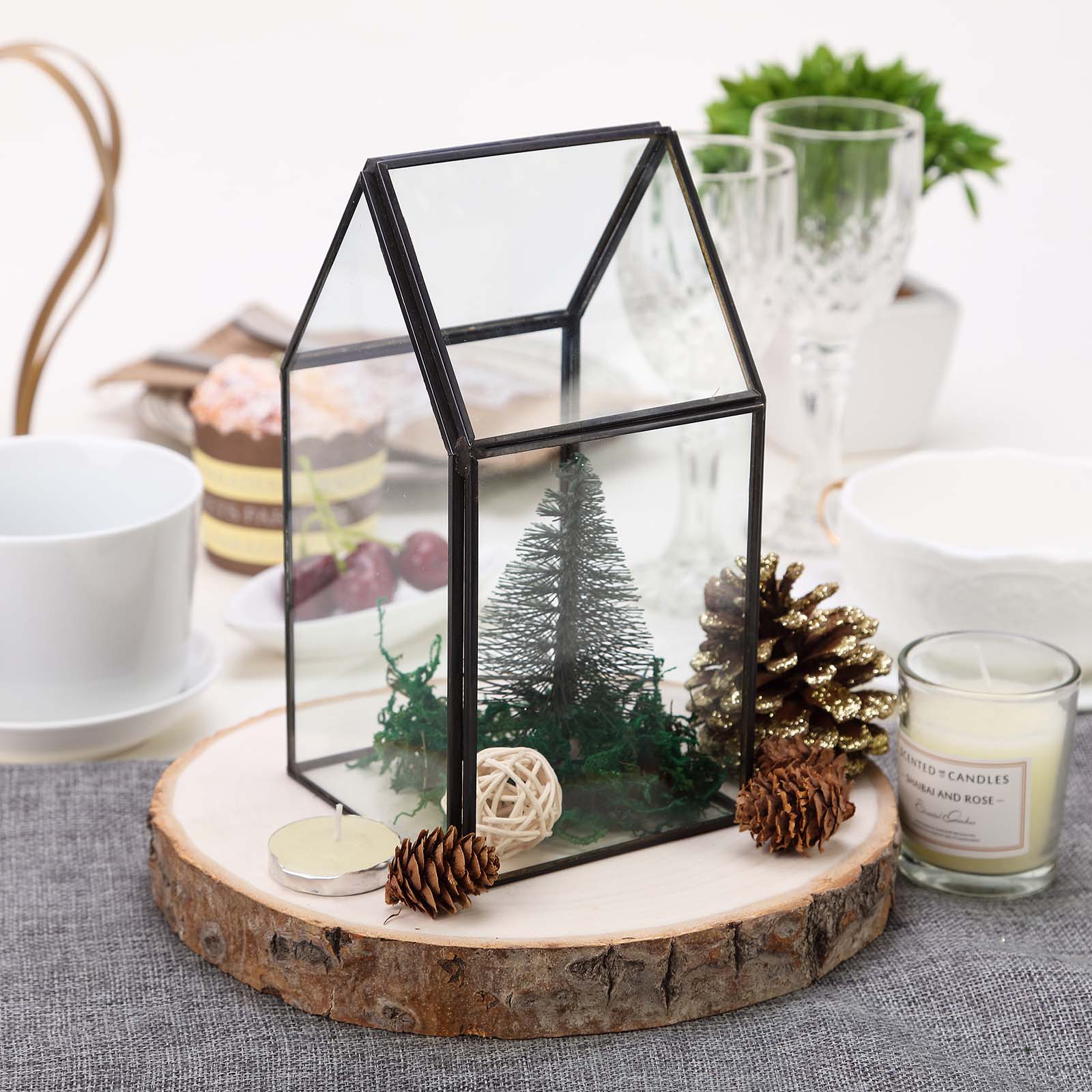 Rustic natural wood slice table centerpiece with greenery and pinecones.