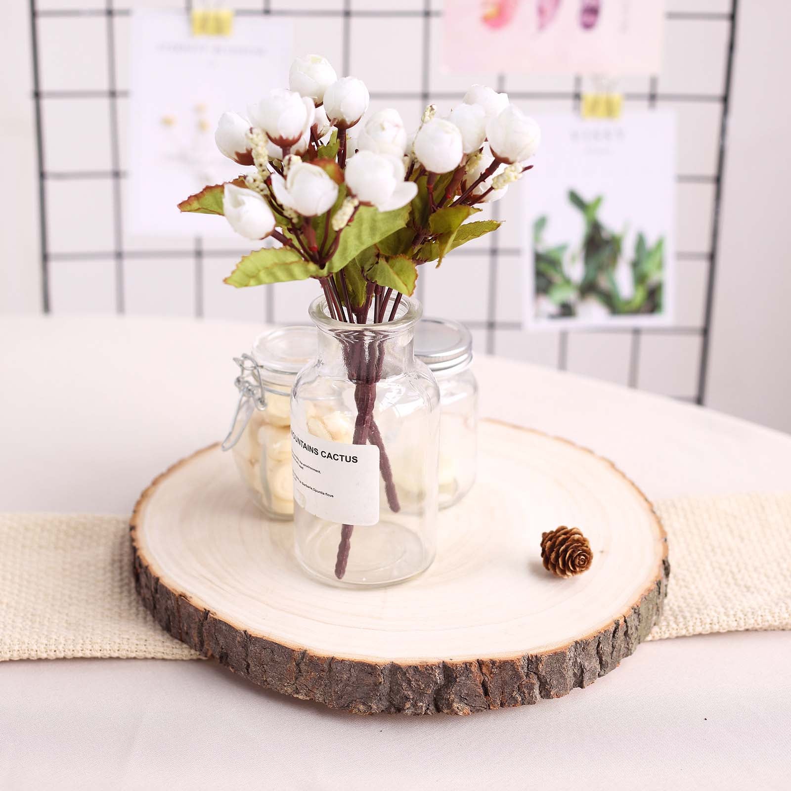 Natural color round rustic wood slice table centerpiece.