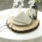 Round rustic wood slice centerpiece with natural wood color and elegant decor.