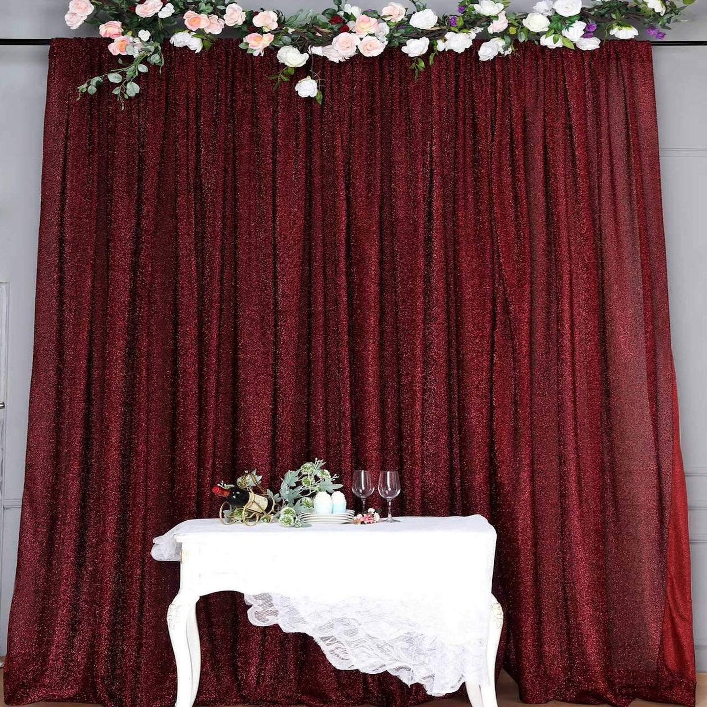 Burgundy metallic shimmer tinsel event curtain drapes backdrop panel.