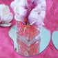 10" Heart Glass Mirror Table Centerpiece with pink flowers and decorations.